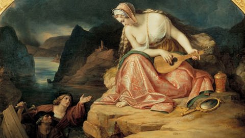 Gemälde von Karl Begas (1794- 1854): Loreley sitzt mit einer Laute auf einem Felsen und blickt zornig hinab zu den Seefahrern, deren Boot gerade versinkt. 